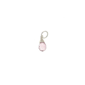 C051005* - Sterling Silver and Faceted Pink Topaz Charm
